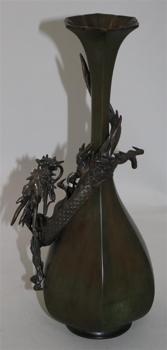 A Japanese bronze dragon hexagonal bottle vase, c.1880, 35.5cm